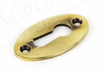 Period Oval Escutcheon - Aged Brass